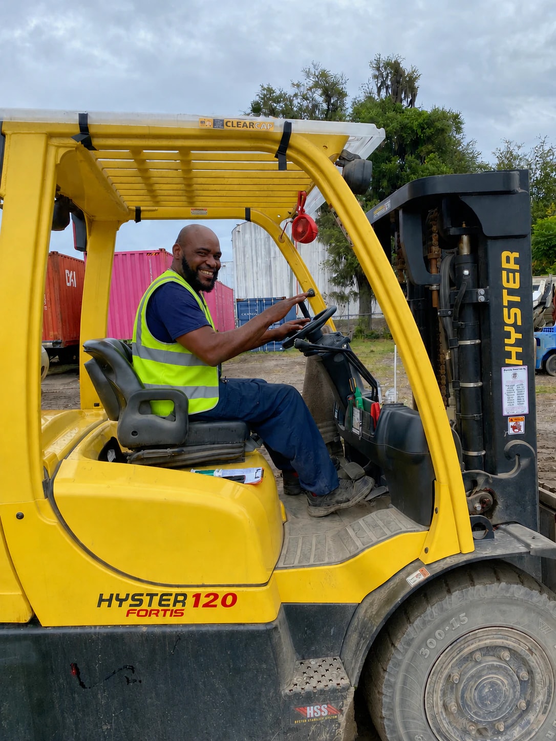 PAZA team member operating a forklift